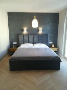 Postel nebo postele na pokoji v ubytování Apartman Marko 2