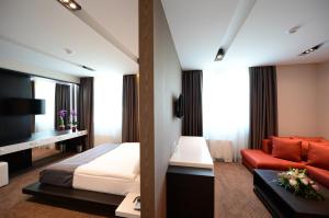 Voodi või voodid majutusasutuse Hotel Hedonic toas