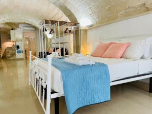A bed or beds in a room at B&B Pietramare