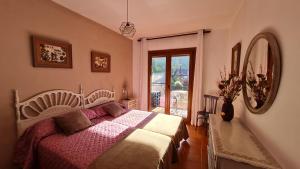 Postel nebo postele na pokoji v ubytování Apartament Vent de Port + 37 fotografií