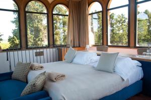 A bed or beds in a room at Tenuta Di Sticciano