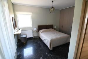 Posteľ alebo postele v izbe v ubytovaní Villa Niso + 9 fotografií