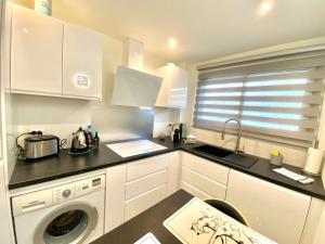 Kuchyň nebo kuchyňský kout v ubytování Eden Barmassa