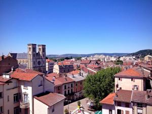 a view of a city with buildings at Ibis Budget Bourgoin Jallieu Centre in Bourgoin