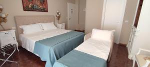 Postel nebo postele na pokoji v ubytování Villa Jasmine B&B