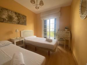 A bed or beds in a room at R17 Casa MERCÉ RODOREDA
