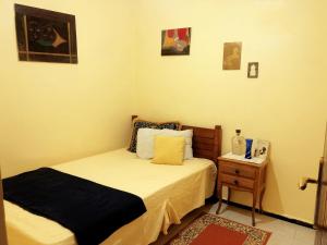 Postel nebo postele na pokoji v ubytování Vibe Surf Morocco