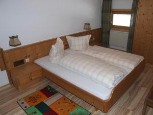 Postel nebo postele na pokoji v ubytování Gasthof Hauserwirt