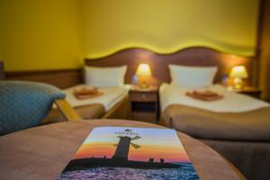 Postel nebo postele na pokoji v ubytování Hotel Polaris + 37 fotografií