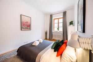 Posteľ alebo postele v izbe v ubytovaní Old Town Market Place Apartment