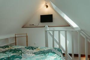 Łóżko lub łóżka w pokoju w obiekcie La Villetta SPA -logement atypique