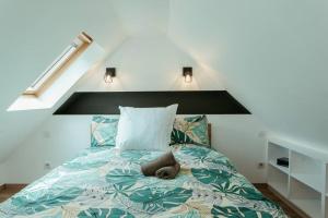 Łóżko lub łóżka w pokoju w obiekcie La Villetta SPA -logement atypique