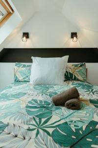 Giường trong phòng chung tại La Villetta SPA -logement atypique
