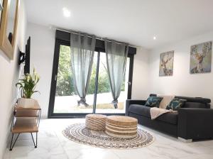 Posedenie v ubytovaní L'escapade.T2 ☆ Jardin ☆ Spacieux ☆ Calme