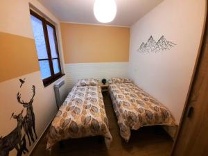 Postel nebo postele na pokoji v ubytování Casa MAGNA
