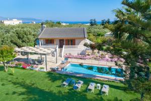 an aerial view of a house with a swimming pool at Santy Villa in Gerani Chanion