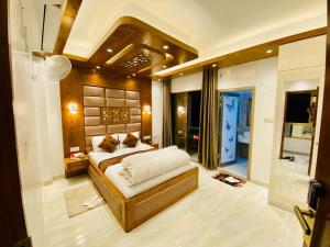 a bedroom with a large bed in a room at Beach Queen Resort in Cox's Bazar +20 photos