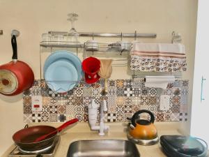 Η κουζίνα ή μικρή κουζίνα στο Portal Mágico +23 φωτογραφίες