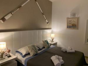 Voodi või voodid majutusasutuse AQUARAMA Rooms & Apartments toas
