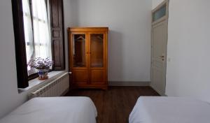 Postel nebo postele na pokoji v ubytování La Villa del Pantano