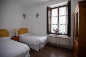 Postel nebo postele na pokoji v ubytování La Villa del Pantano