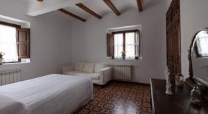 Postel nebo postele na pokoji v ubytování La Villa del Pantano