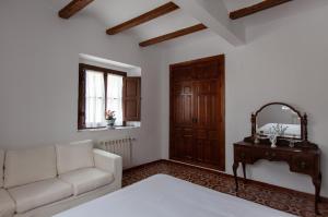 Postel nebo postele na pokoji v ubytování La Villa del Pantano