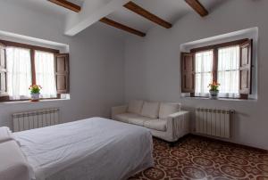 Postel nebo postele na pokoji v ubytování La Villa del Pantano
