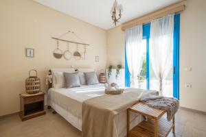 Posteľ alebo postele v izbe v ubytovaní Saint Minas Suite Home