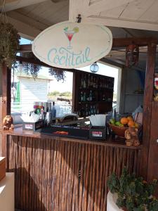 a fruit stand with a sign on the front of it at B&B Purple Italy in Fiumicino