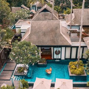 The swimming pool at or close to Anantara Mai Khao Phuket Villas