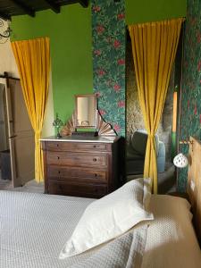 A bed or beds in a room at L'Incanto di Civita