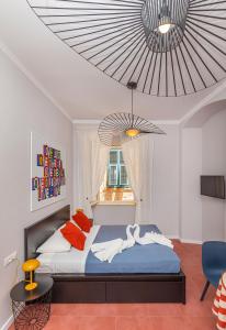 Postel nebo postele na pokoji v ubytování Cap Rooms
