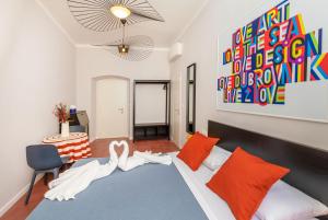 Postel nebo postele na pokoji v ubytování Cap Rooms