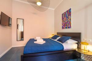Postel nebo postele na pokoji v ubytování Cap Rooms