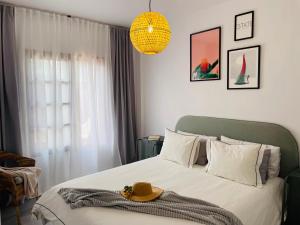 Cama o camas de una habitación en Torres Beach