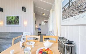 a table with a bowl of fruit on top of it at St, Andreasberg, Haus 50 in Sankt Andreasberg