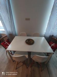 Posezení v ubytování Ster na Mazury - apartamenty Mrągowo