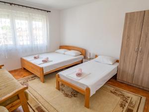 Krevet ili kreveti u jedinici u objektu Apartments Karamach