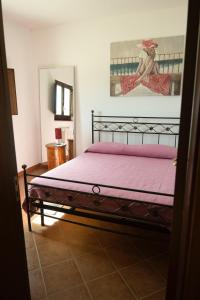 En eller flere senger på et rom på Villino Panorama