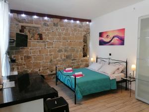 Ένα ή περισσότερα κρεβάτια σε δωμάτιο στο Apartment Central 1