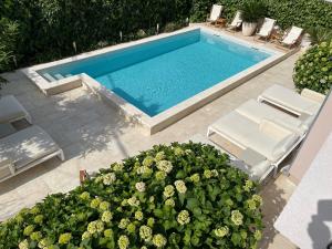 Swimmingpoolen hos eller tæt på Apartments Pean