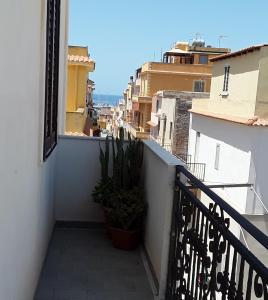 a balcony with a view of a city at Casa Mary in Lampedusa