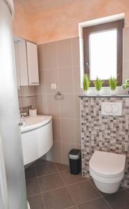 Kúpeľňa v ubytovaní Teo Apartments