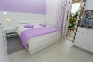 Posteľ alebo postele v izbe v ubytovaní Villa Alesa