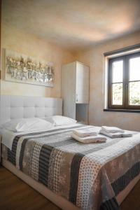 Posteľ alebo postele v izbe v ubytovaní Teo Apartments