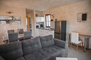 Kuchyňa alebo kuchynka v ubytovaní Teo Apartments