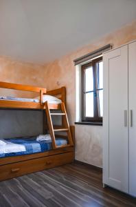 Posteľ alebo postele v izbe v ubytovaní Teo Apartments
