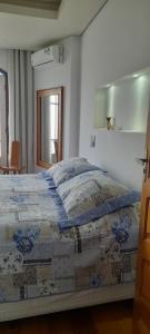 En eller flere senge i et værelse på Casa Caminho da Serra