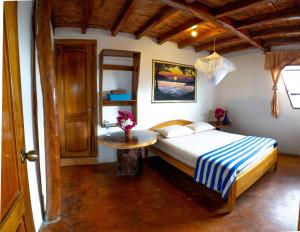 Krevet ili kreveti u jedinici u okviru objekta Hostal Rutamar
